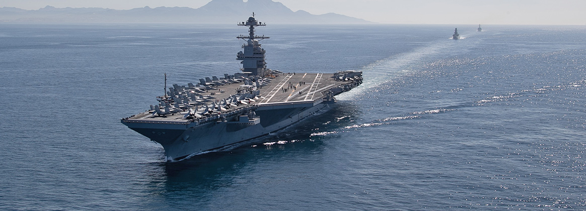 USS Gerald R. Ford (CVN 78), the Italian navy frigate Alpino (F 594) and the Arleigh Burke-class guided-missile destroyer USS Roosevelt (DDG 80) transit the Strait of Gibraltar,